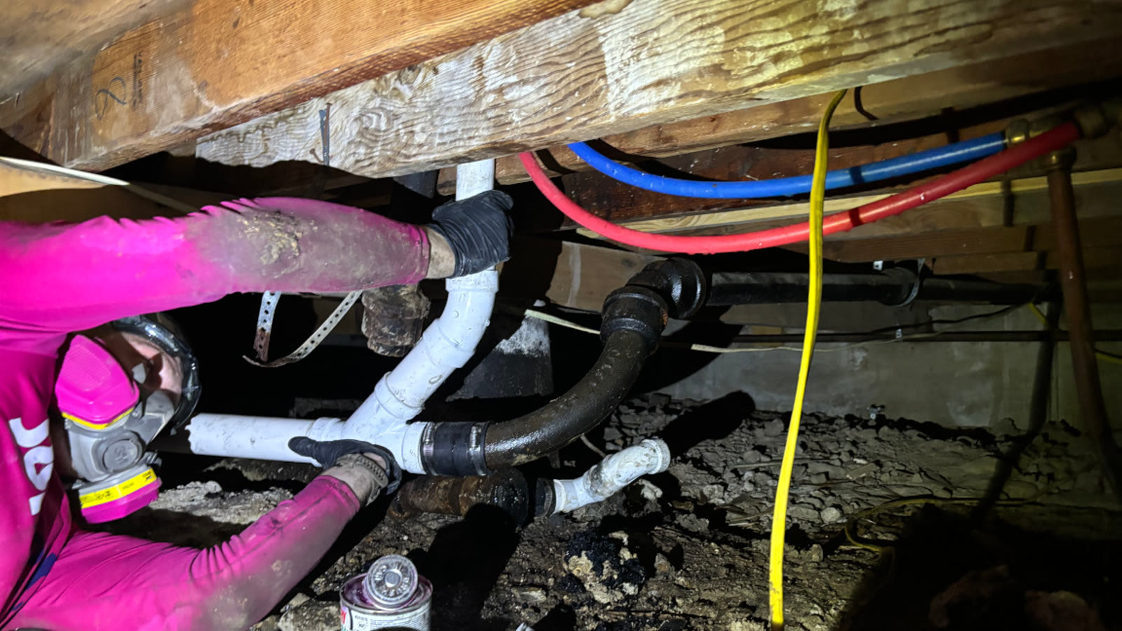 Pipe repair work beneath a Summerville home